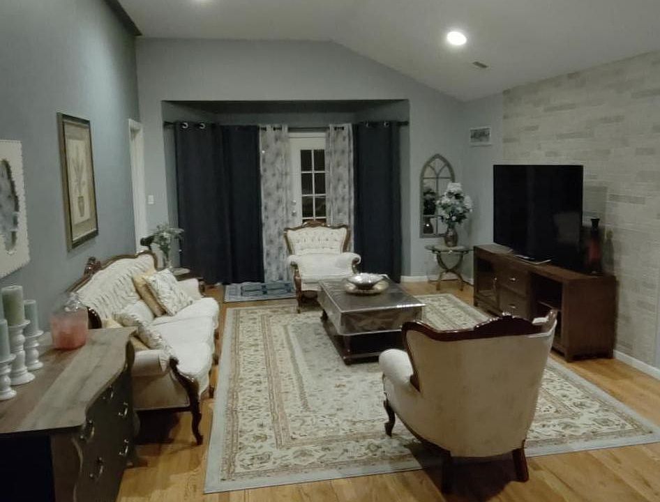 Living room, extra room on the side not pictured serves as office space.