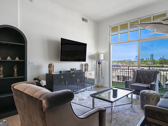 5th image of 711 Cosmopolitan Dr NE Unit 815