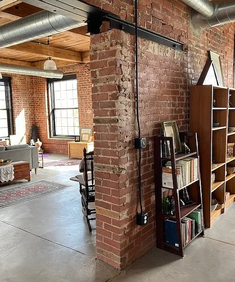 similar loft live/work shows how the rooms are split. Has a sliding barn door