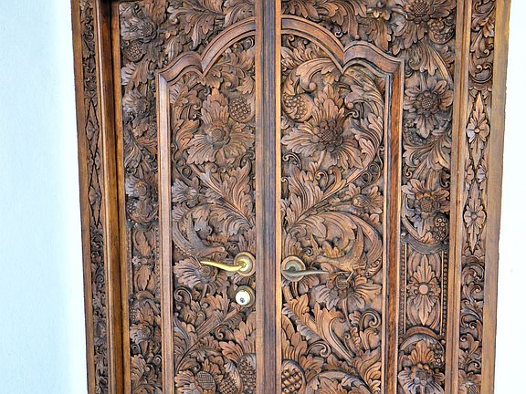 Entry. Notice the elegantly detailed hand-carved wood entry door.