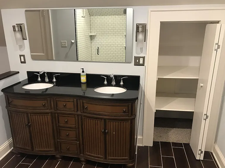 Double sinks with Linen Closet