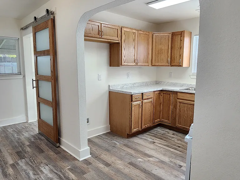 New kitchen with dining area on left