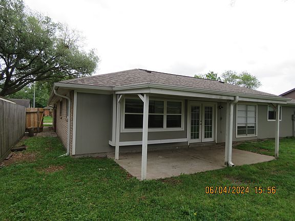 The covered patio for those hot summer days. The nice thing about this house is that you don't have to worry about the sun. Plus, the view is great.