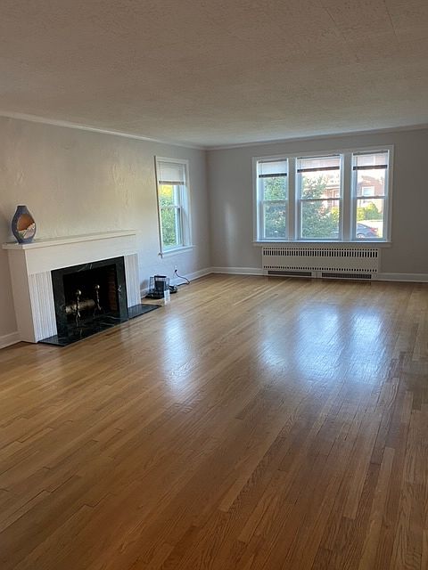 Huge living room with decorative fireplace