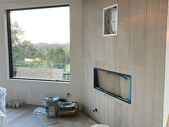 New gas fireplace with limestone