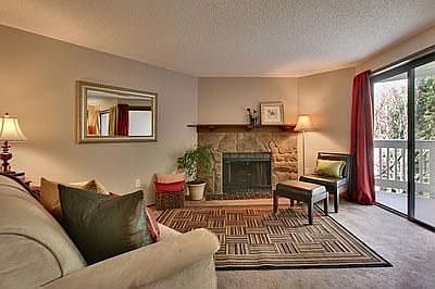 A wood burning fireplace, sliding glass doors that lead to a private deck. This is a spacious condo 