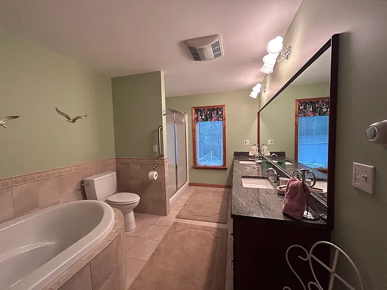 full bathroom ensuite tub and shower
