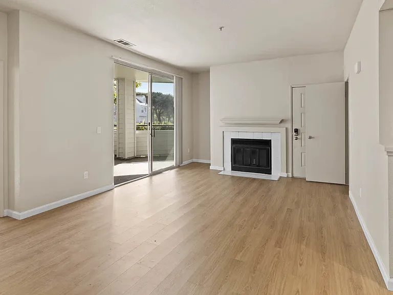 Living Room with Fireplace and Hard Surface Flooring