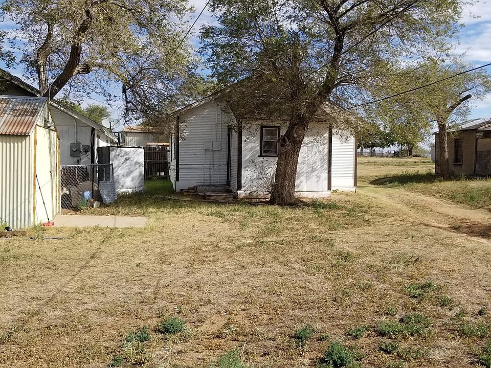View from E. Central, big backyard (no fence)