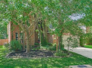 15 Harmony Hollow Ct, Conroe, TX 77385
