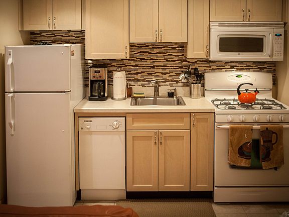 Kitchen Area with Microwave and Dishwasher
