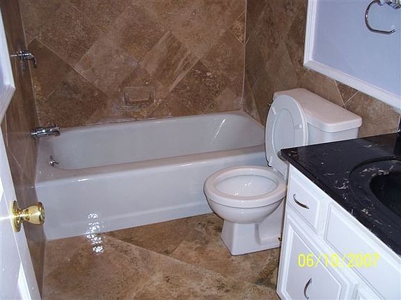 Travertine Tiled Baths