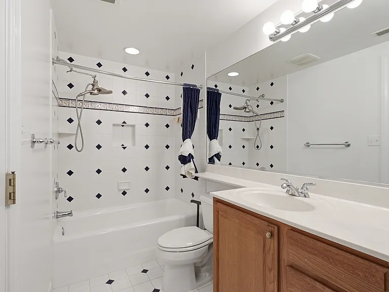 Lower level full bathroom with washer/dryer.