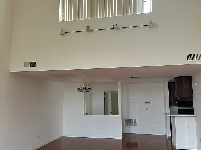 High ceilings, dining room, and entryway