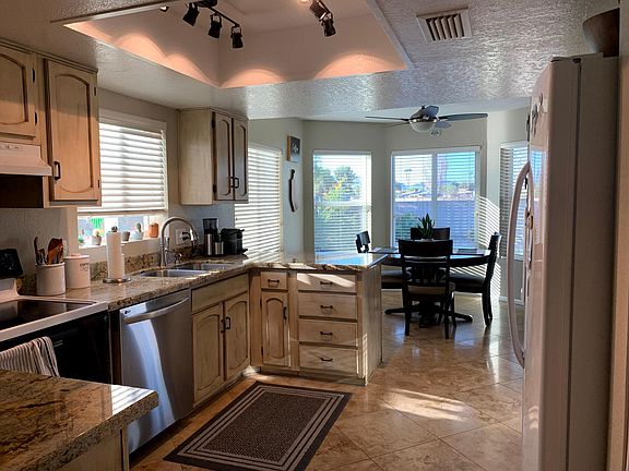 Kitchen with dining area in background