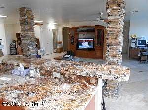 View from Kitchen Island toward TV and E
