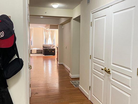 Grand Hallway - View of Bedroom/Den with French Doors