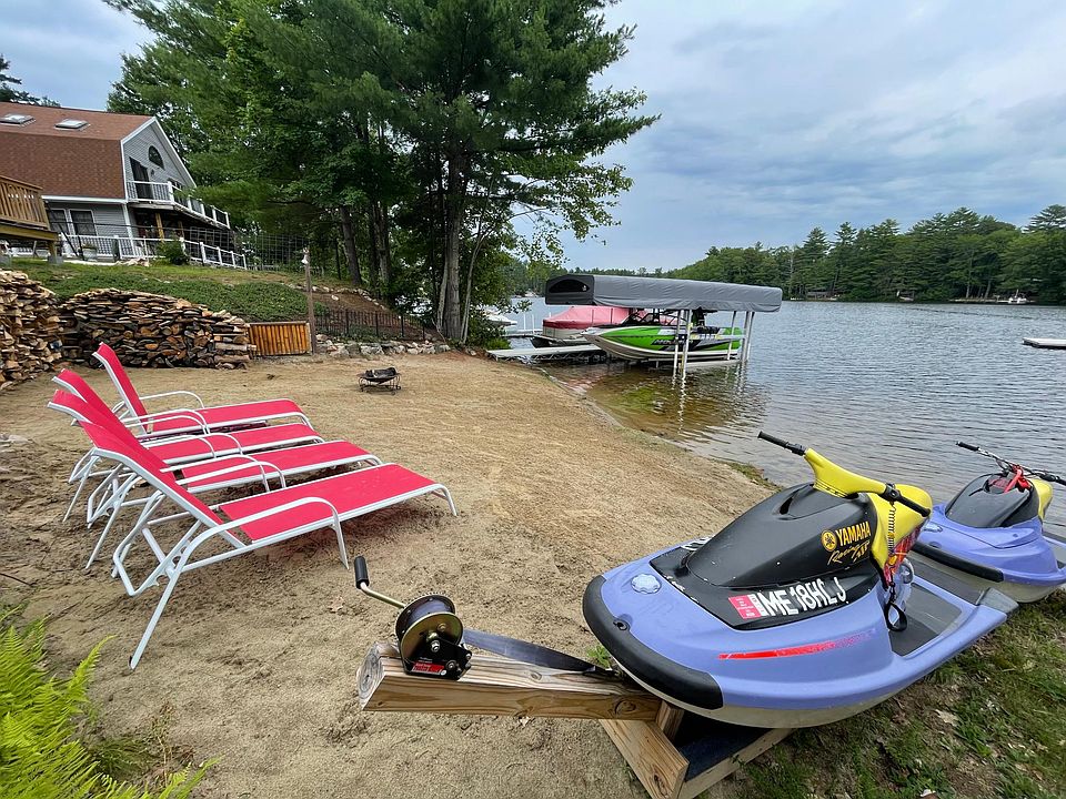 Most homes on the lake enjoy the water from rock wall or dock this home has a lovely private beach