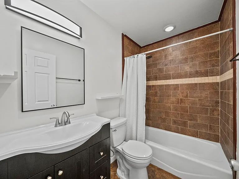 7707 Apperson St — Photo 12