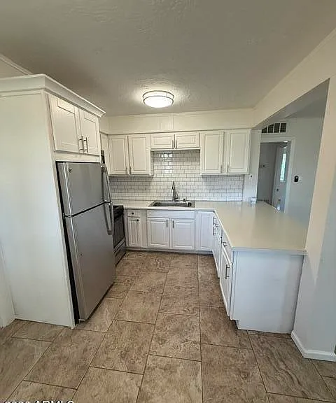 2545 E Clarendon Ave #3 — Photo 3