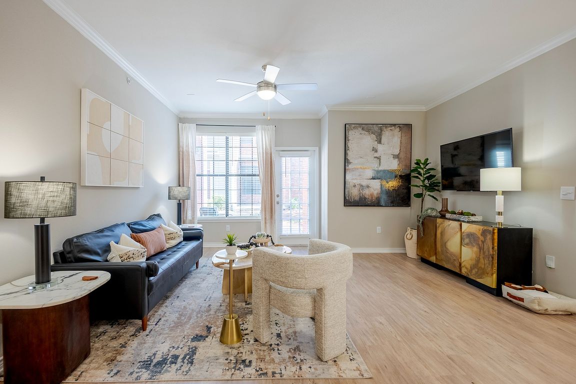 Newly Renovated Living Room with Gorgeous Hardwood Style Flooring