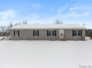 7815 N Marble Rd, Howard City, MI 49329