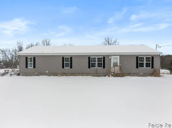 7815 N Marble Rd, Howard City, MI 49329