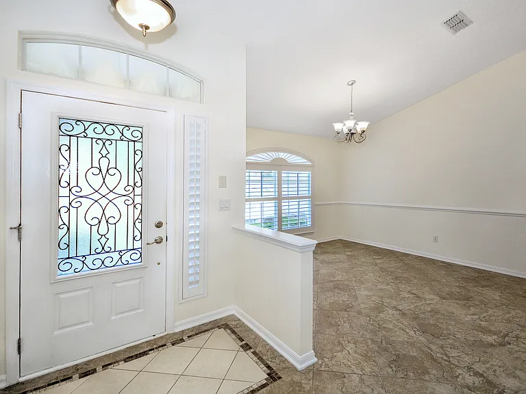Front entry with dining room, picture right