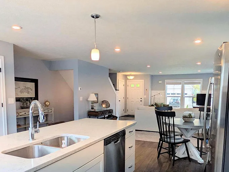 Beautiful Kitchen Island, with stainless appliances.