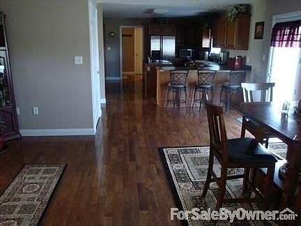 the double concrete driveway makes for easy maneuvering of many vehicles