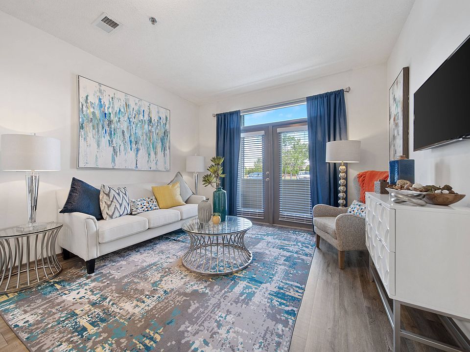 Charming Living Room with Hardwood-Style Flooring