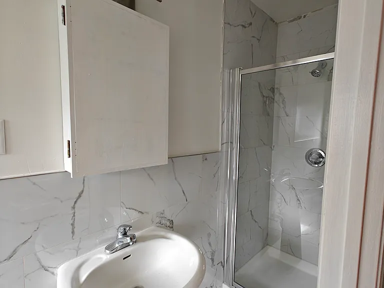 standing shower in master bedroom