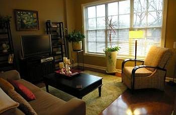Living area with large window brings in lots of light!