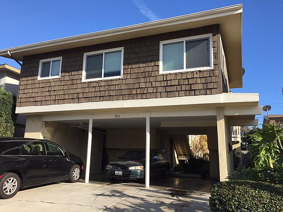 Quiet triplex, owned and managed by the same person since 1986. Parking is for two cars front to back on right hand side.