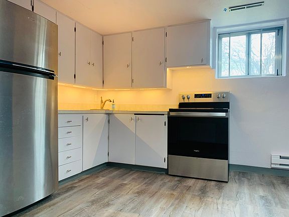 Deep kitchen cabinets offer significant storage.