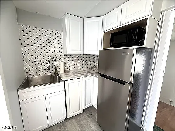 8239 Suncoast Dr — Photo 8