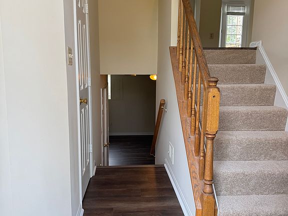 Foyer to Main Living Up, and Basement/Garage/Laundry Down