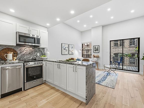 3rd image of 35 E 10th St APT 5F