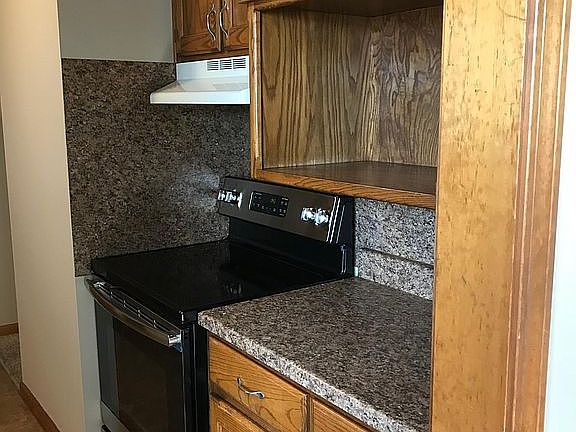 New stove and newer counters and pulls.