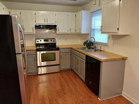 Updated kitchen with butcher block countertops