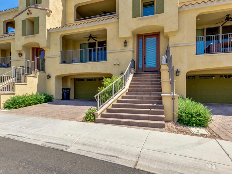 Front of house, two entries. Enter through garage, or front steps. Garage entry level 1, stairs entry level 2.