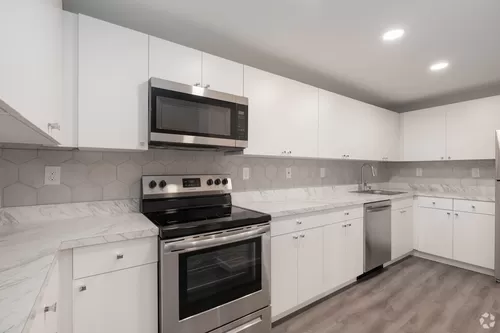 Renovated kitchens with Stainless Steel Appliances - The Falls at Roland Park
