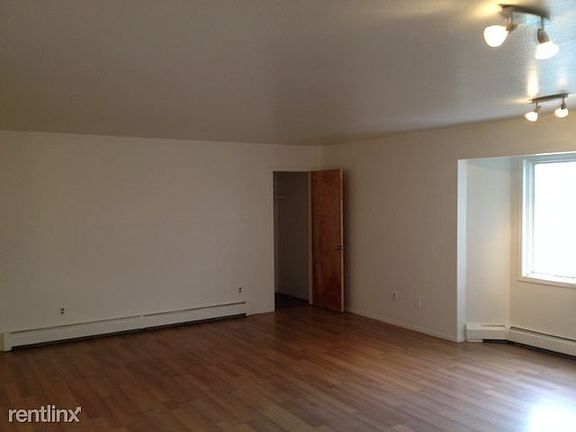Large living area with storage closet