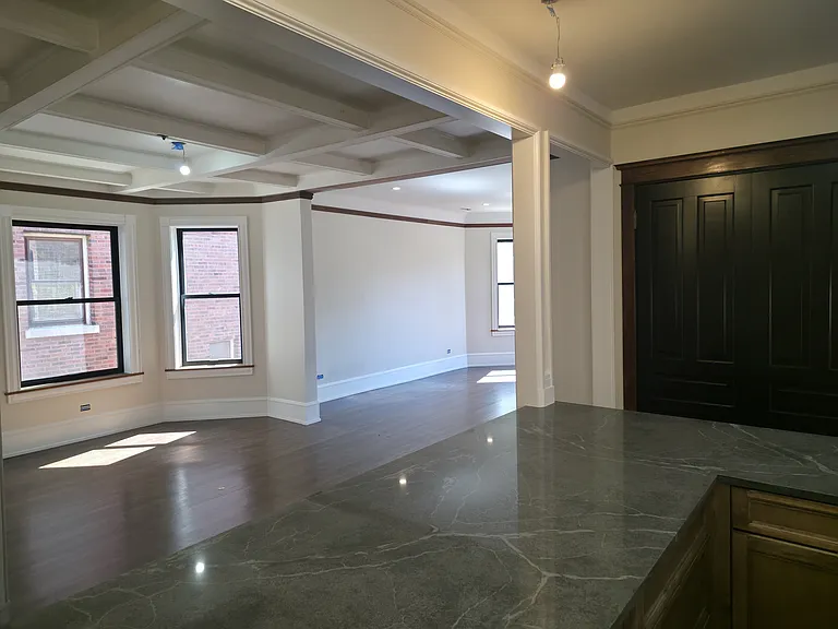 Looking out from kitchen to dining, living areas