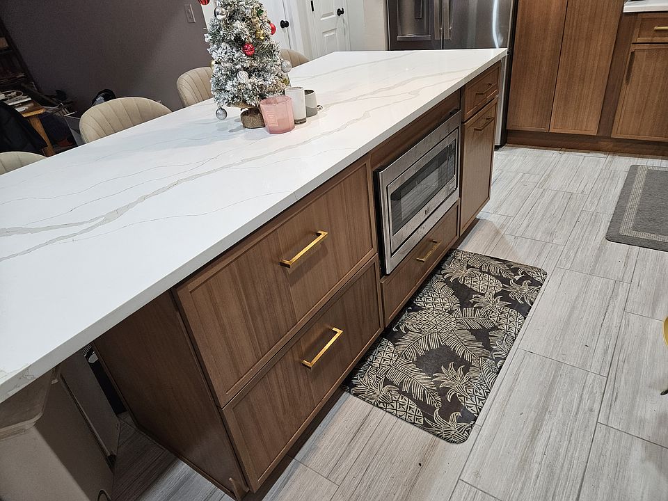Kitchen island with built-in microwave