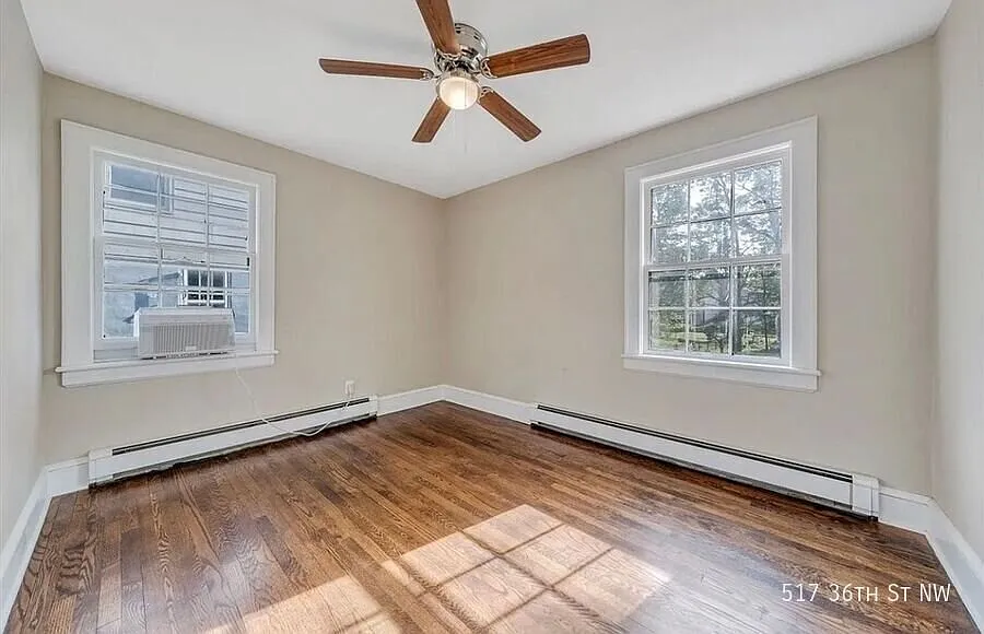 Charming 2BR Home with Hardwood Floors & Private Yard — Photo 4