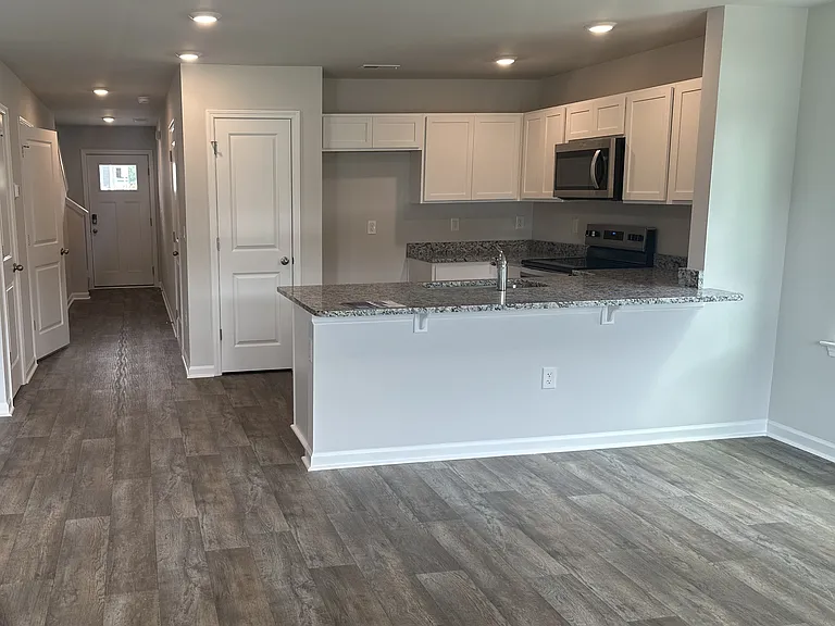 Bar seating; Refrigerator has been installed