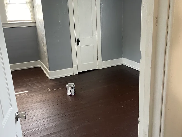 Upstairs BR from Doorway with Hardwood Flors and Ceiling Fan showing Closet Door