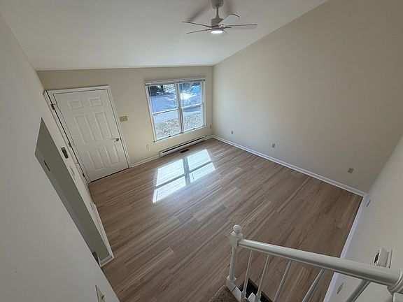 Family room offers space and style-- high ceilings offer modern appeal