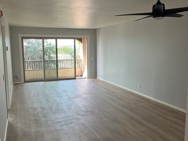 Living/Dining room with balcony